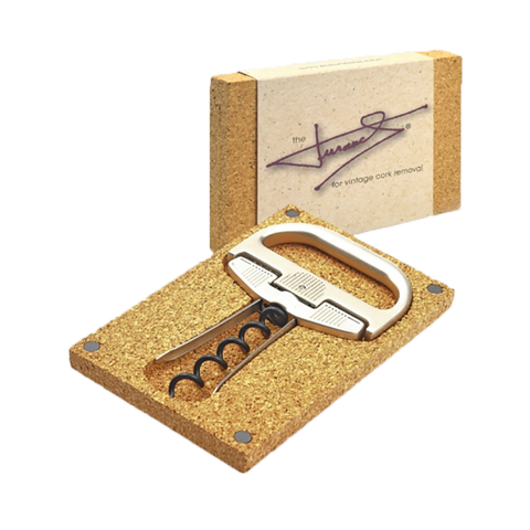 Corkscrew set with corkscrew and bottle opener on cork base, branded 'Vintner's Choice'.