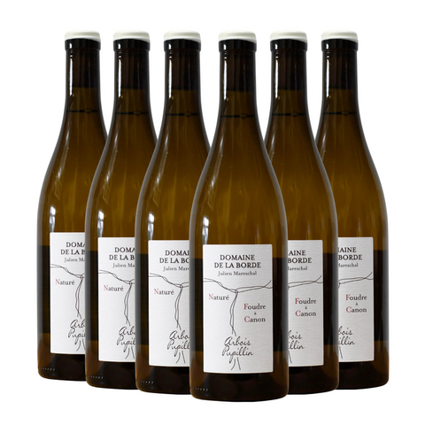 Six bottles of Domaine de la Borde wine on a white background