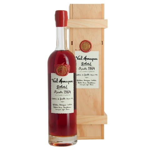Bottle of Veuil Armagnac Delord with wooden box on a white background