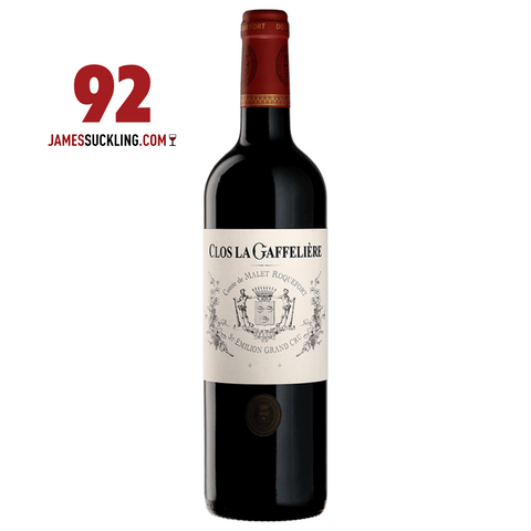Bottle of Clos La Gaffelière wine with a James Suckling score on a white background