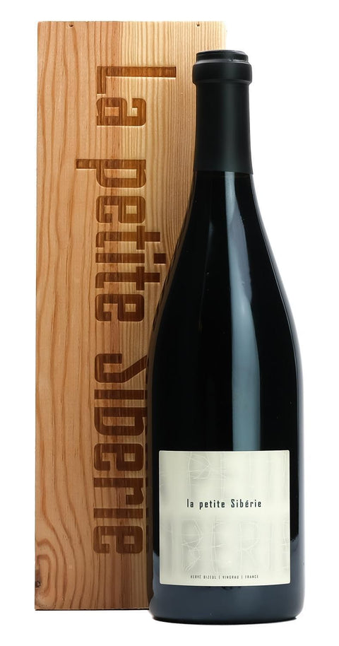 Wine bottle with wooden box labeled 'La petite Siberie' on a white background